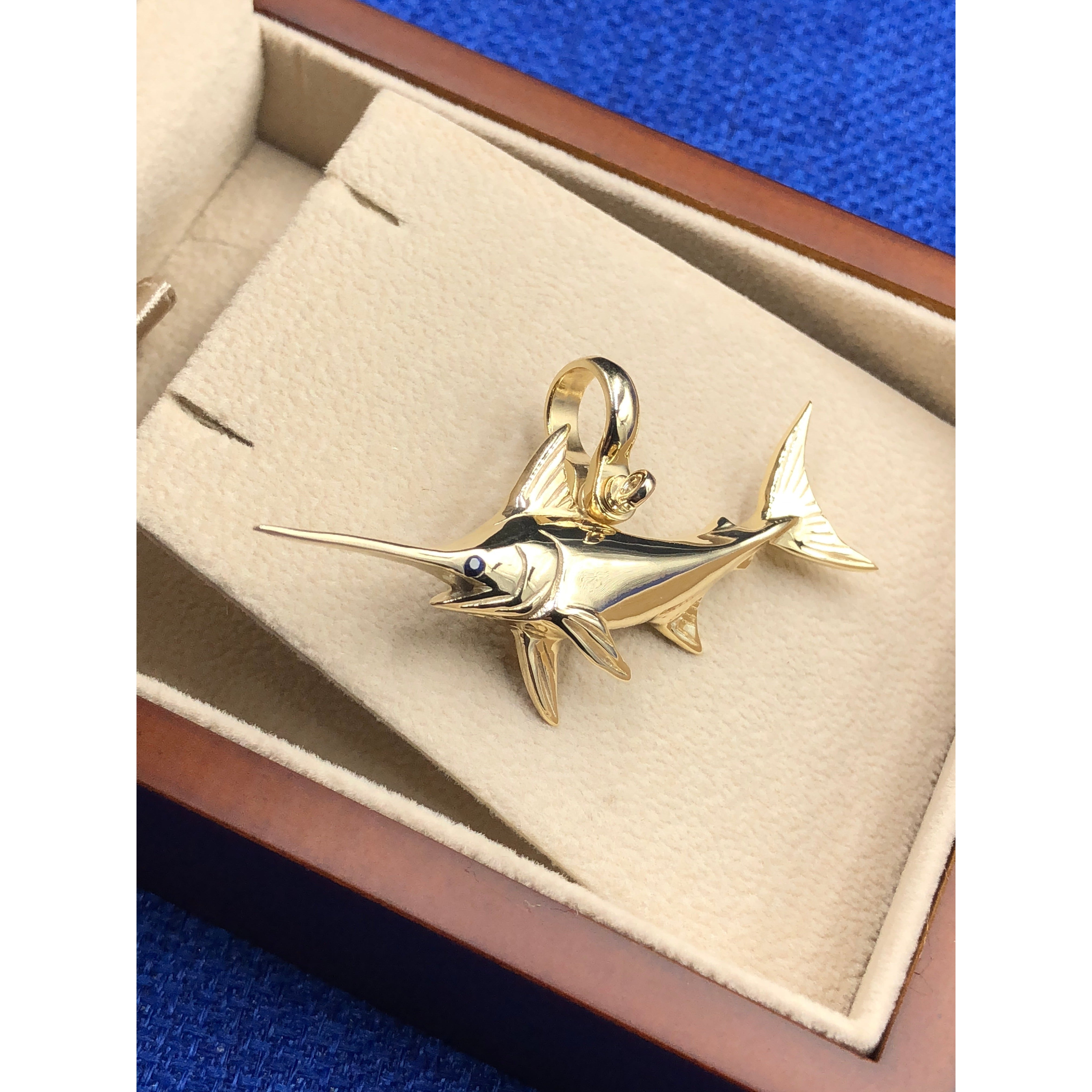 Nautical Treasure ® 10K 14K 18K Gold Swordfish Pendant with Sapphire Eye and Large Shackle Bail (fits up to 8mm chain). Pendant Specificatons Measurement: 2 1/4" in length approximately Weight: 14 Grams Nautical Jewelry, Mens Jewelry, Fishing Jewelry, Angler, Broadbill Swordfish