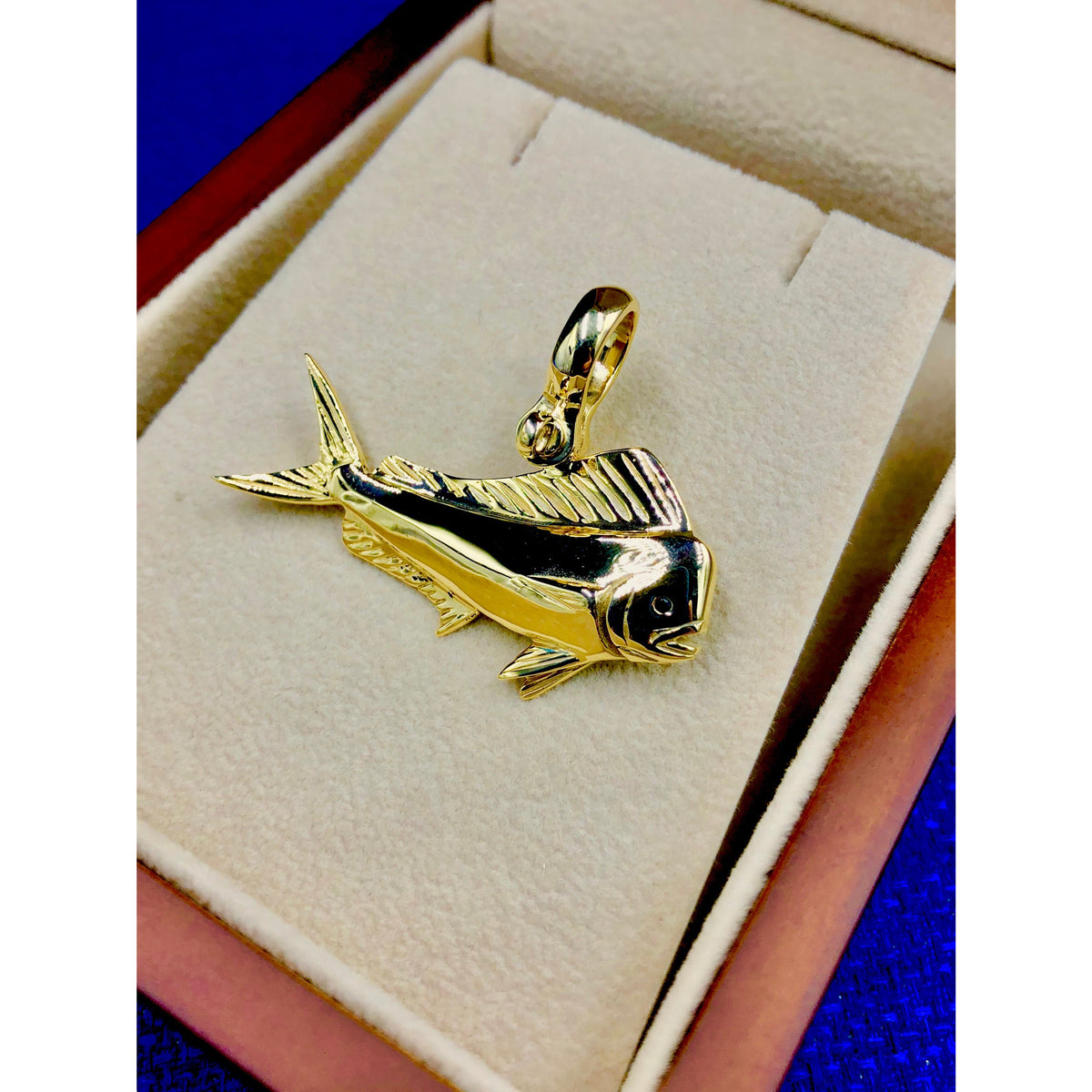 Nautical Treasure ® 10K 14K 18K Gold Mahi Dorado Dolphin Pendant with Sapphire Eye and Large Shackle Bail (fits up to 8mm chain).    Pendant Specificatons   Measurement:  1 1/2" in length approximately  Weight: 8 Grams Nautical Jewelry, Mens Jewelry, Fishing Jewelry, Offshore Angler, Bull Dolphin